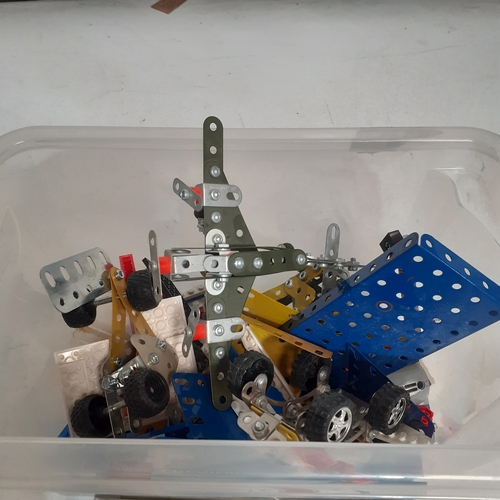 21B - Tub of random Meccano and Lego bits mixed plus a Lego and Mecano booklet. Includes part built plane ... 