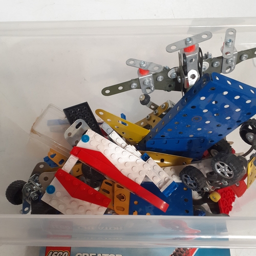 21B - Tub of random Meccano and Lego bits mixed plus a Lego and Mecano booklet. Includes part built plane ... 