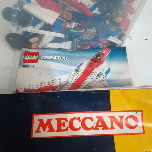 21B - Tub of random Meccano and Lego bits mixed plus a Lego and Mecano booklet. Includes part built plane ... 