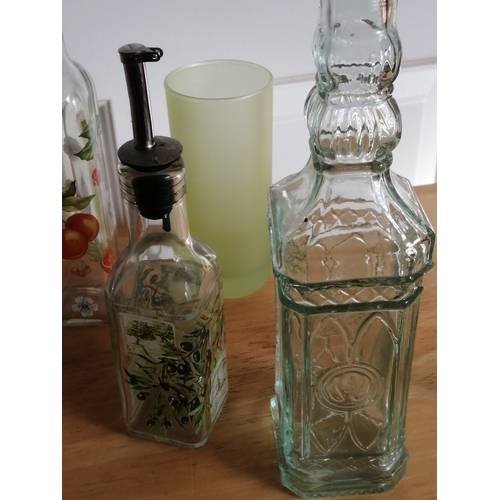 40A - Various glassware including a pair of green twisted stem candle holders Olive oil bottle etc