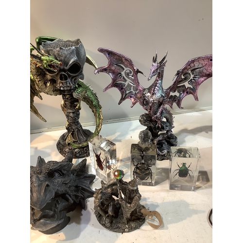 54 - Mythical items includes dragons & skulls - also beetles in clear resin.