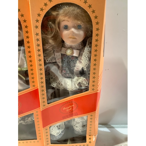 56 - 3 boxed porcelain dolls Louise Elizabeth & catherine