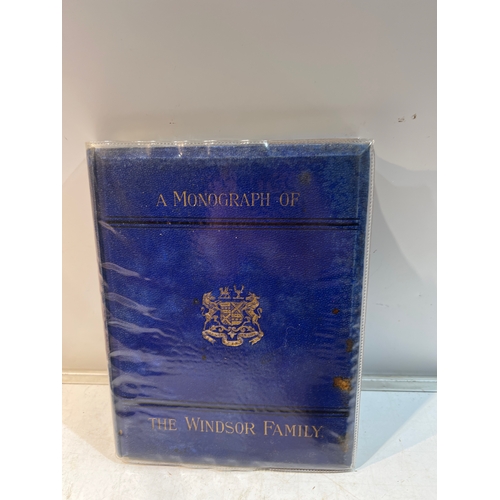 143 - A monograph of the Windsor family 1878 and small album of post cards