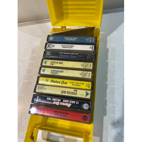 161 - Status quo cassette tapes in yellow shed case