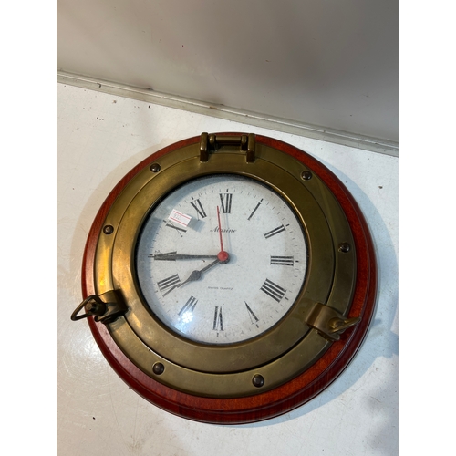 174 - Marine Swiss quartz battery operated port hole style clock