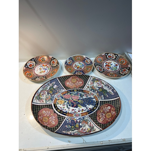 183 - Four oriental plates - one being 50cm