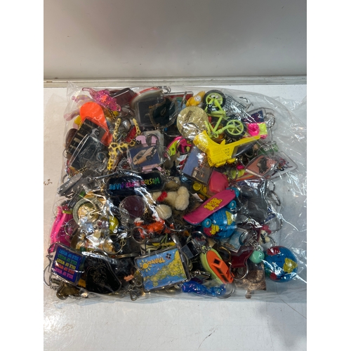 186 - Large quantity of collectible keyrings inc Star Wars, hot rod, 90s tv shows and much much more