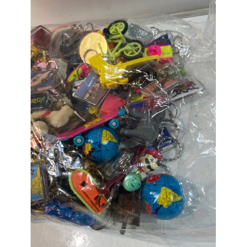 186 - Large quantity of collectible keyrings inc Star Wars, hot rod, 90s tv shows and much much more