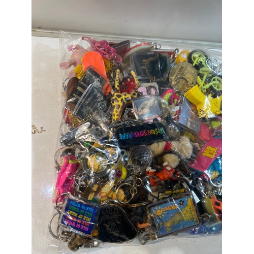 186 - Large quantity of collectible keyrings inc Star Wars, hot rod, 90s tv shows and much much more