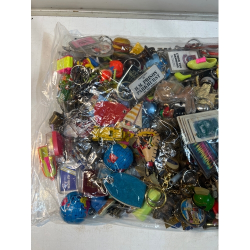 186 - Large quantity of collectible keyrings inc Star Wars, hot rod, 90s tv shows and much much more