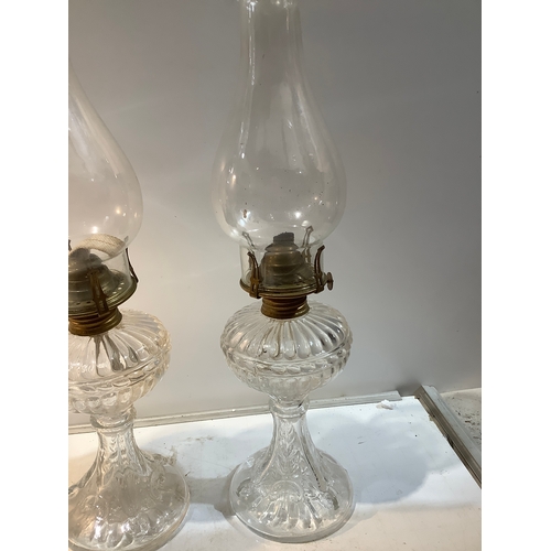 306 - 3 matching glass oil lamps