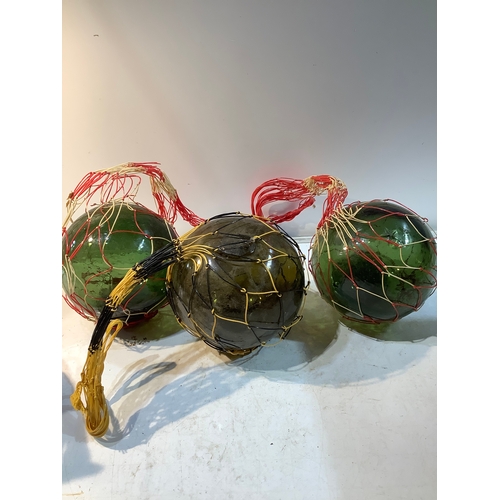 310 - Vintage green glass fishing floats