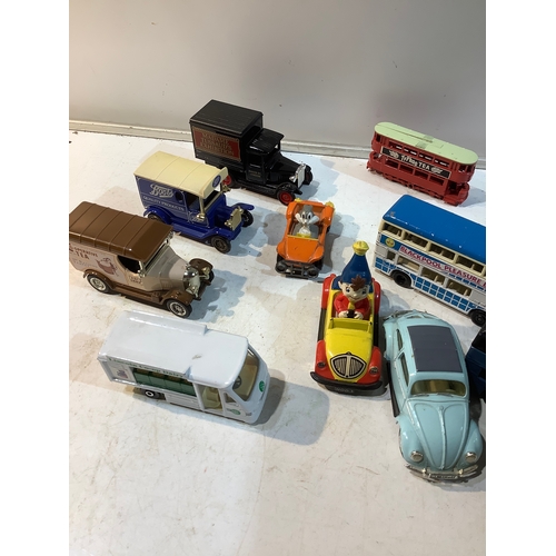 252 - Some play worn cars buses inc bugs bunny noddy vw  makes like  Lledo matchbox days gone etc