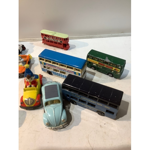 252 - Some play worn cars buses inc bugs bunny noddy vw  makes like  Lledo matchbox days gone etc