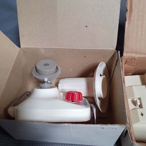 116 - Knitting accessories. Wool winder and Intarsia carriage for K-82A. Original packaging