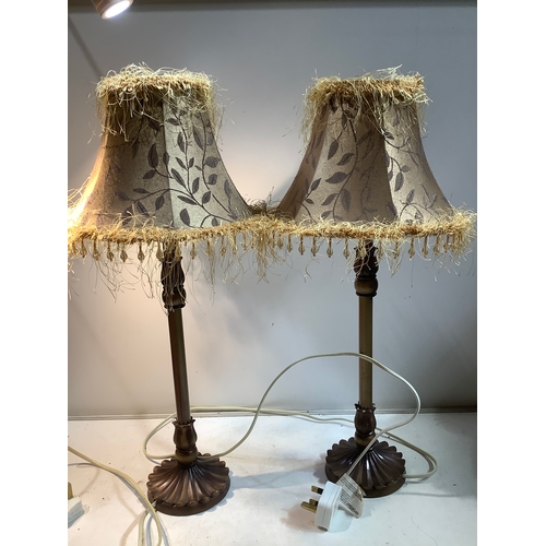 177 - Pair of matching gold lamps