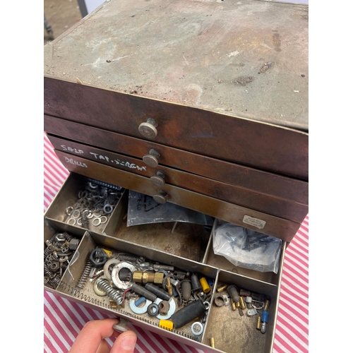 59 - Brass fronted metal set of drawers - 6 bank - 26cm high