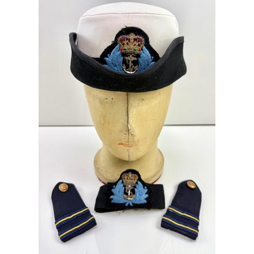 76 - Women’s Royal Navy uniform hat with shoulder patches and badge