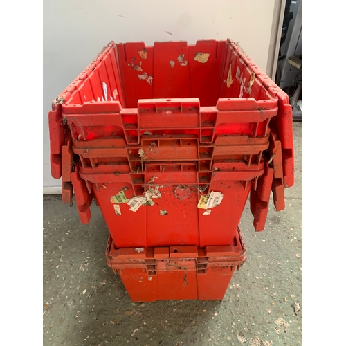 144 - Set of four stacking plastic boxes