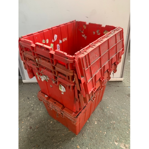 144 - Set of four stacking plastic boxes