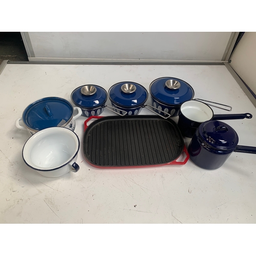 174 - Selection of blue metal saucepans and a cast iron grill