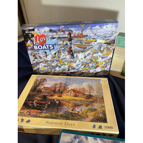 116 - Selection of 5 jigsaw puzzles summer Days, Storm Chased, vets visit, Goose Cottage and I Love boats