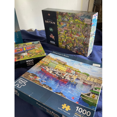 118 - Selection of 5 jigsaw puzzles to include Fishermen’s boats, An Evening in Paris, Steam Loco, Beautif... 