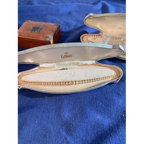 119 - 3 sets of lotus simulated pearls, 2 jewellery boxes and one other chain necklace