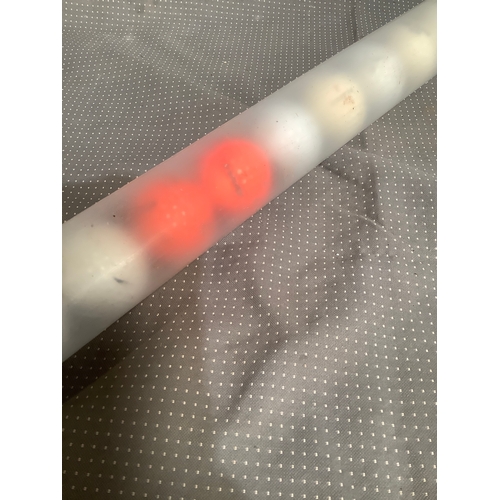 128 - Tube of golf balls