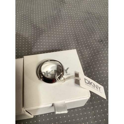 130 - 3 designer rings in Dkny boxes one is dkny diesel and guess