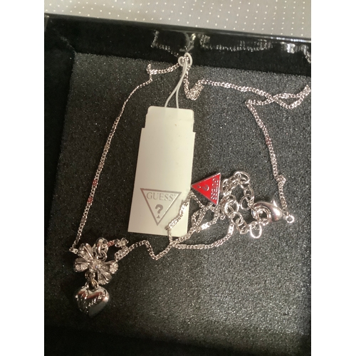 134 - Designer Guess ring & necklace