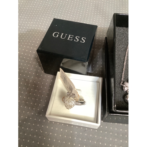 134 - Designer Guess ring & necklace