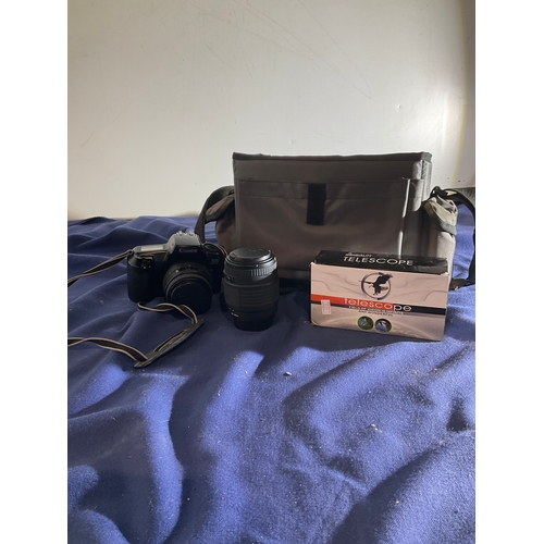 141 - High quality Telescope and Canon EOS 1000F with lens