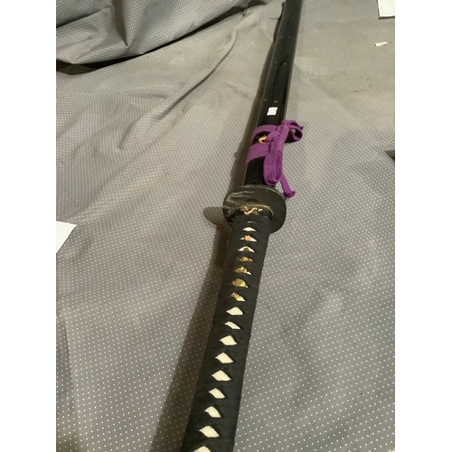 153 - Japanese hand forged sword with sheath