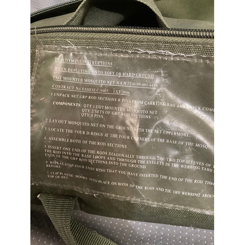 154 - Military issued cot mounted mosquito net