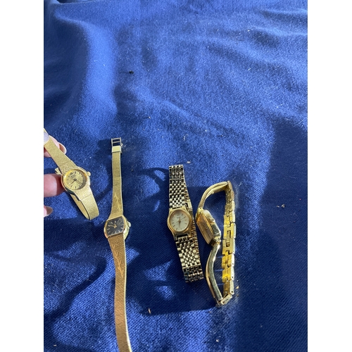155 - Selection of ladies gold coloured watches including Seiko, Titan and accurist
