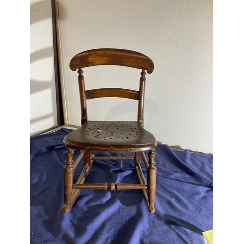 150 - Child’s wooden rocking chair