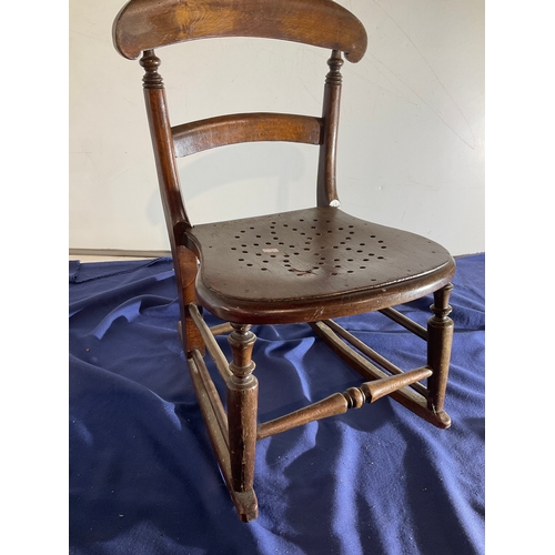 150 - Child’s wooden rocking chair