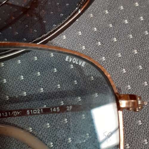 182A - 2 pairs of sunglasses. One genuine Rayban Evolve and O-Luminum Hatchet.