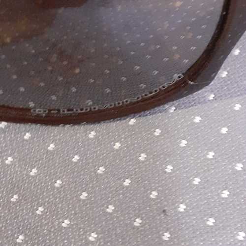 182A - 2 pairs of sunglasses. One genuine Rayban Evolve and O-Luminum Hatchet.