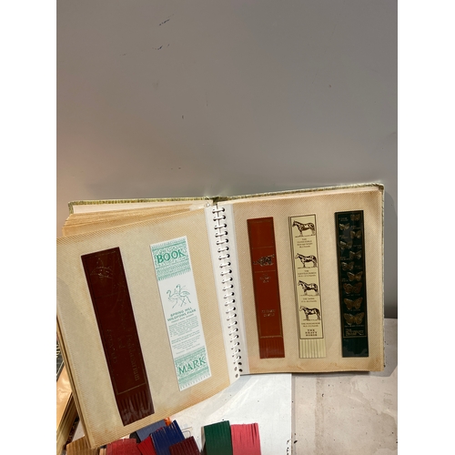 39 - A collection of 3 folders and various loose bookmarks