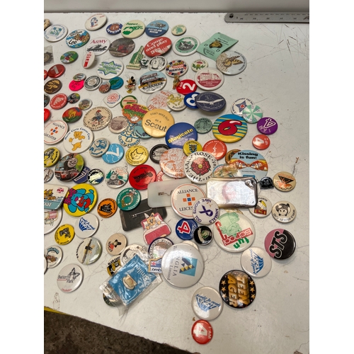 13 - Large quantity of pin badges inc Thomas the tank engine, age badges, Minnie Mouse and more