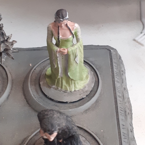 31 - Lord of the Rings pewter figurine collection. On display stand. Good condition just dusty from stora... 