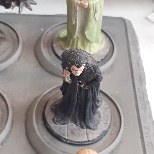 31 - Lord of the Rings pewter figurine collection. On display stand. Good condition just dusty from stora... 