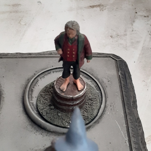 48 - Lord of the Rings pewter figurine collection. On display stand. Good condition just dusty from stora... 