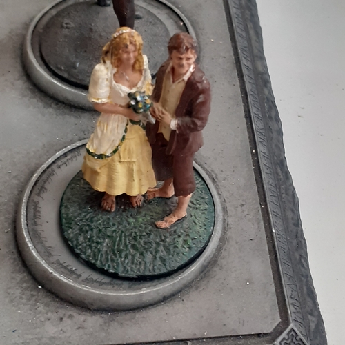 48 - Lord of the Rings pewter figurine collection. On display stand. Good condition just dusty from stora... 