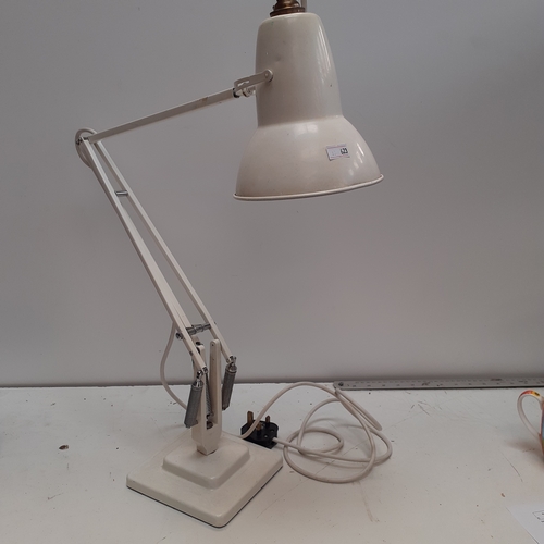 Vintage, metal, angled lamp. 2 step base. Made by Herbert Terry and ...