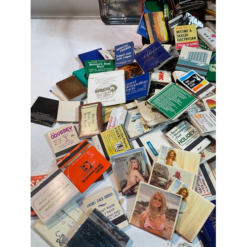 21 - Large collection of match books including advertising and a few with nude ladies, playboy club etc