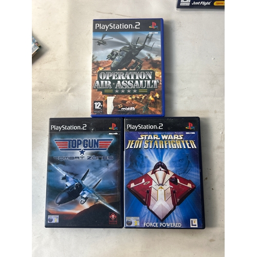 214 - Mix of games inc Wii Sports, PC flight games, PS2 inc Top Gun etc