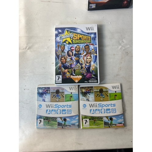 214 - Mix of games inc Wii Sports, PC flight games, PS2 inc Top Gun etc